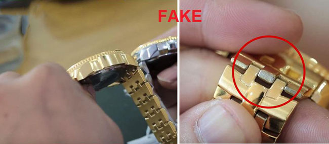 Dây kim loại đồng hồ giả lỏng lẻo, không mịn, màu mạ không đều và nhẹ