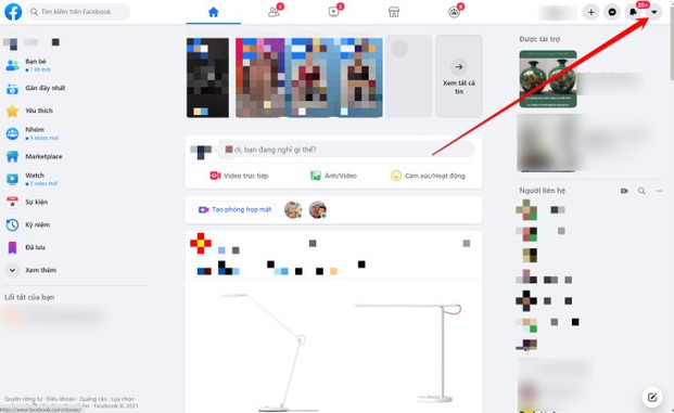 Chọn biểu tượng tam giác trên màn hình facebook